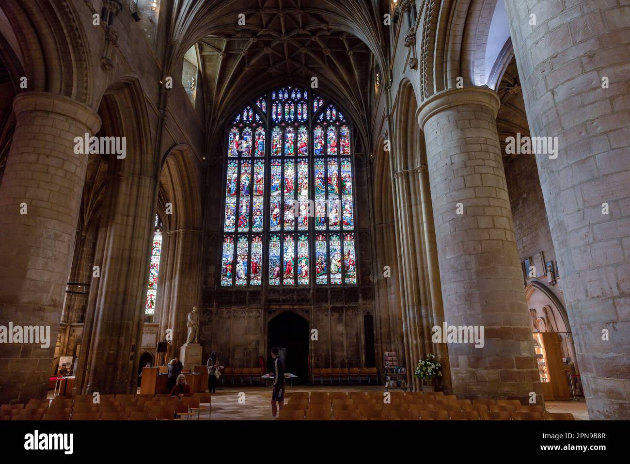 Gloucester, UK. 13th April, 2023. The West Window of Gloucester Cathedral. The stained glass made by William Wailes of Newcastle was installed in 1859 as a memorial to Bishop of Gloucester Dr J. H. Monk. Credit: Mark Kerrison/Alamy Live News Stock Photo