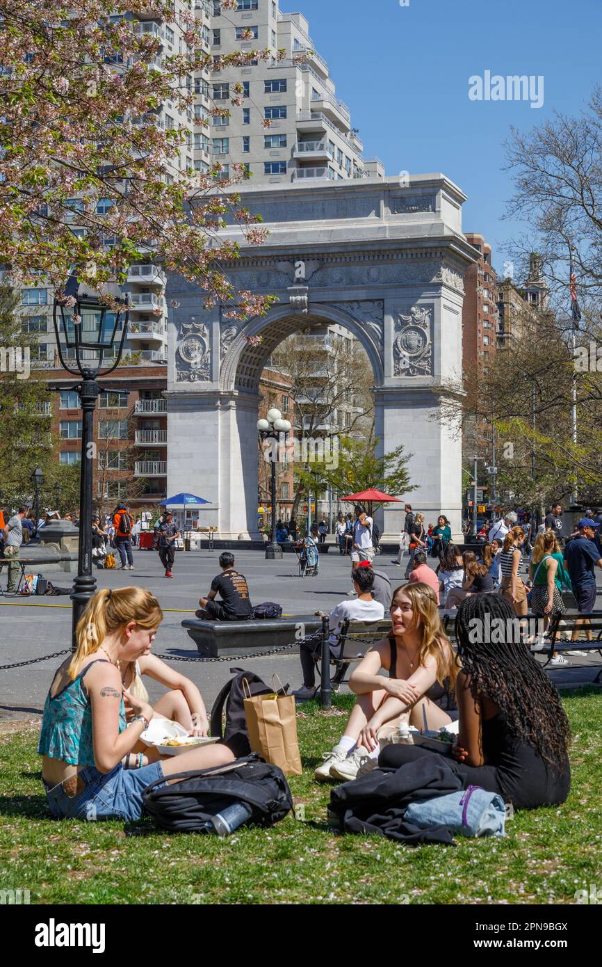 Crowds enjoy Washington Square Park on a fine Spring Day, Greenwich Village, New York City. Stock Photo