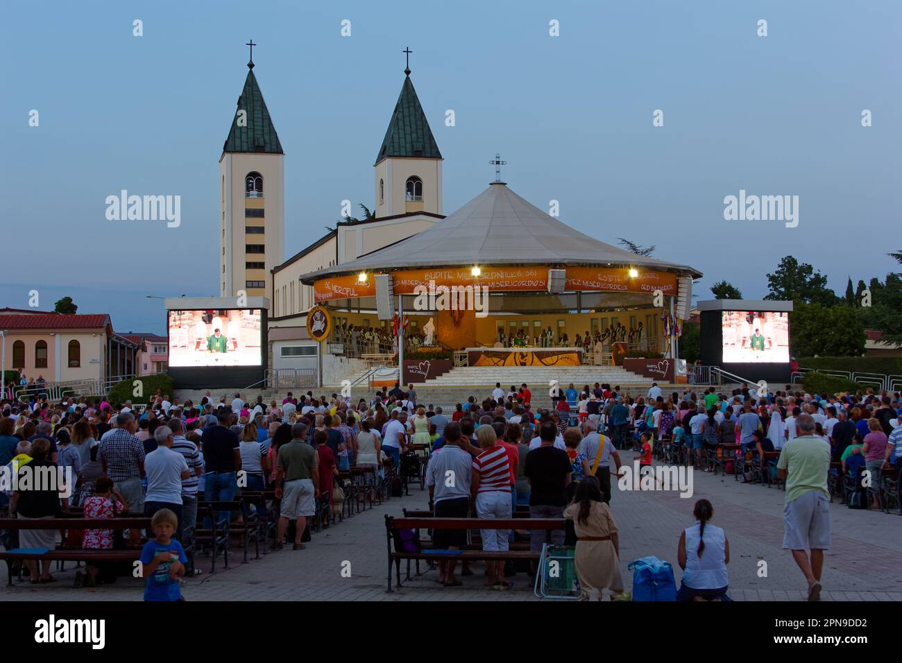 An evening Holy Mass at the outdoor altar in Medjugorje, Bosnia and Herzegovina. Stock Photo