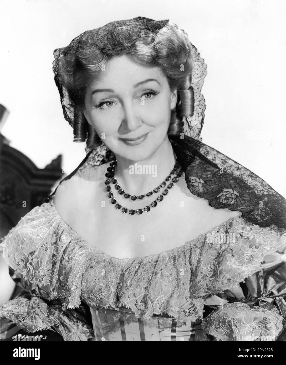 HEDDA HOPPER Portrait as Aunt Henrietta in REAP THE WILD WIND 1942 director CECIL B. DeMILLE based on Saturday Evening Post story by Thelma Strabel screenplay Alan Le May Charles Bennett and Jesse Lasky Jr. music Victor Young costume design Natalie Visart Paramount Pictures Stock Photo