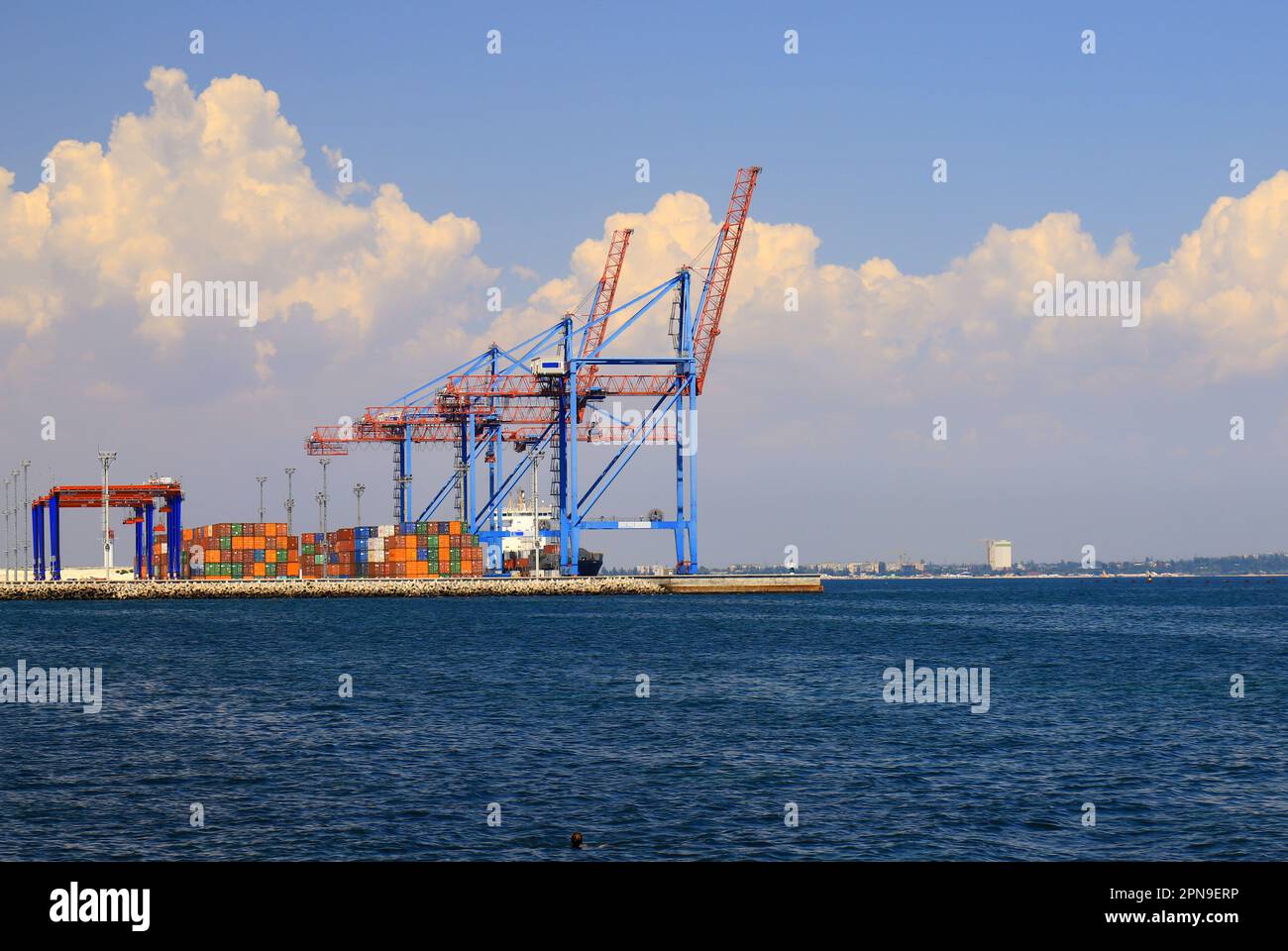 Seaport Odessa, Ukraine. Export of grain from Ukraine. Cranes load ships, containers in sea port of Odesa. Grain agreement, delivery of goods, food, a Stock Photo