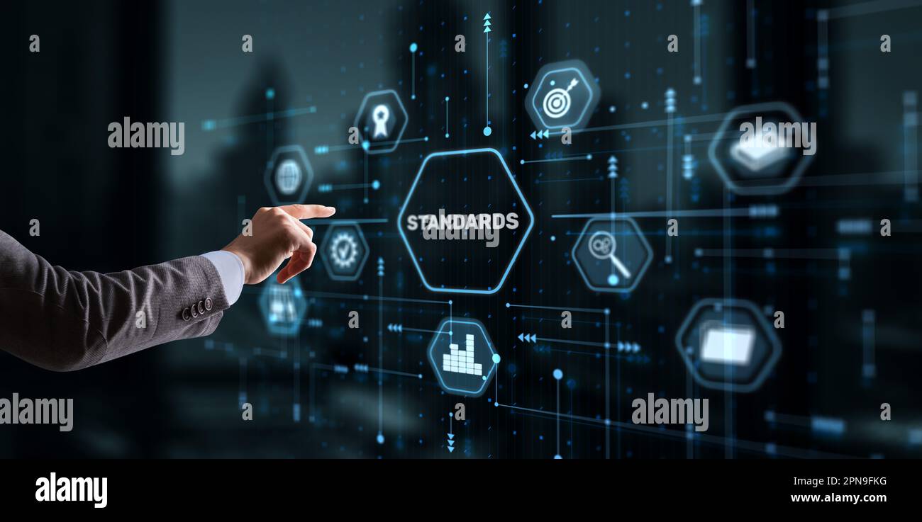 Businessman clicks Standards Quality assurance and control concept ...