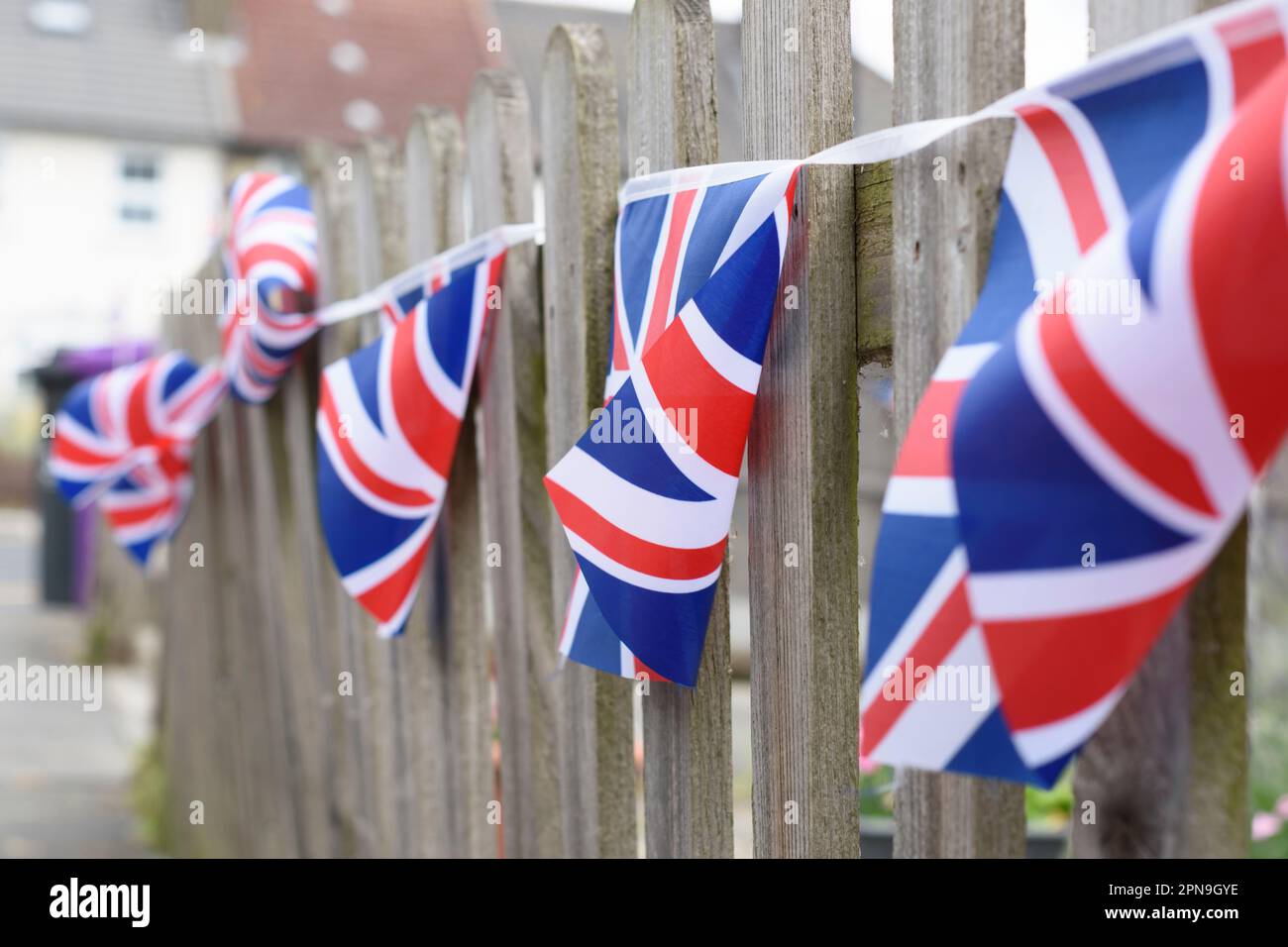 Union Jack flags hanging ready to national holiday celebration. Shallow