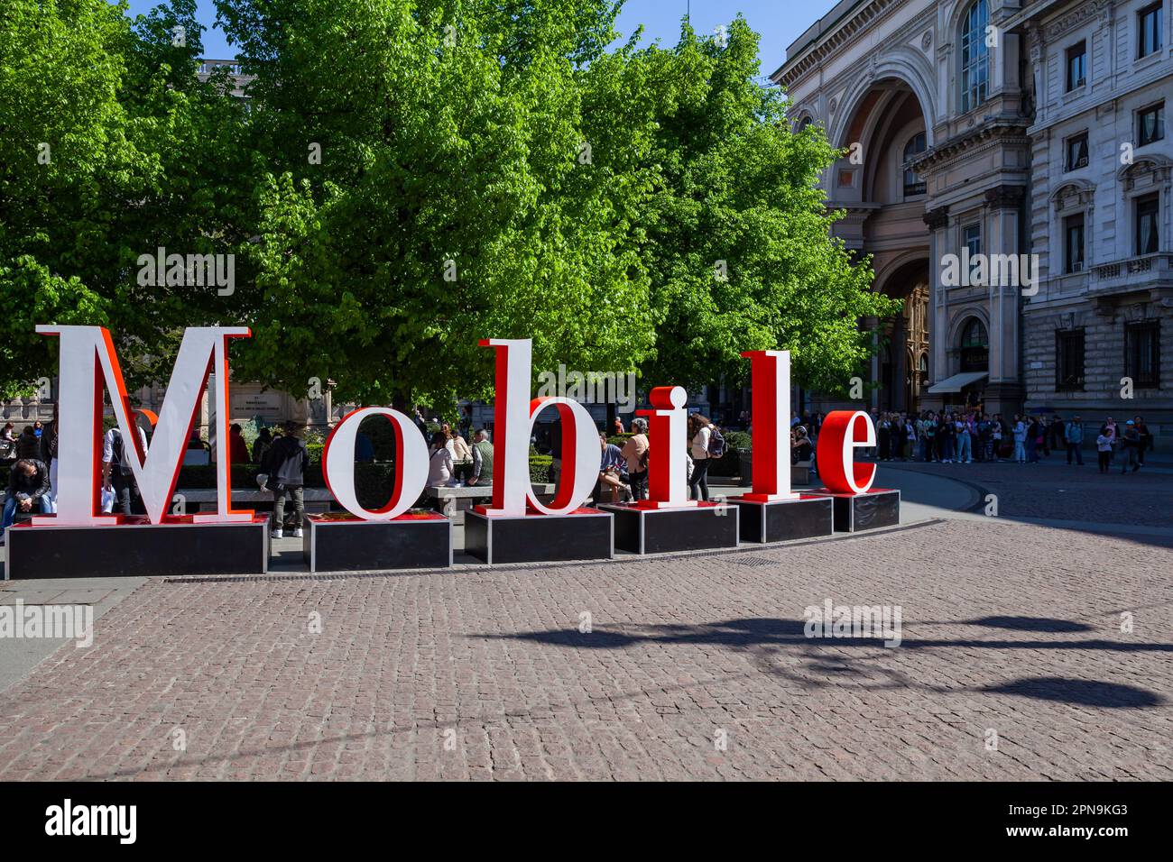 Milan, Italy - April 17, 2023: Design Week Fuorisalone. Installation of maxi letters, Salone del Mobile in front of the Scala theater in the square Stock Photo