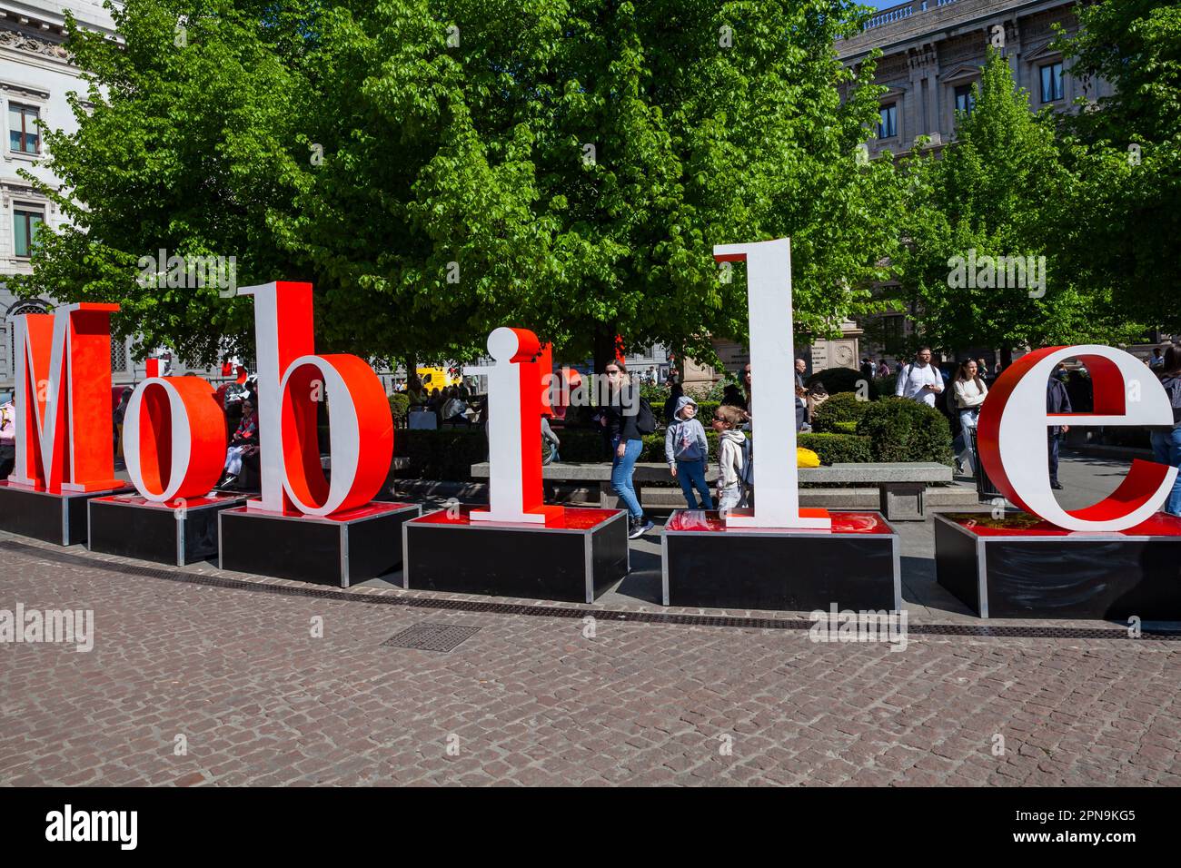 Milan, Italy - April 17, 2023: Design Week Fuorisalone. Installation of maxi letters, Salone del Mobile in front of the Scala theater in the square Stock Photo