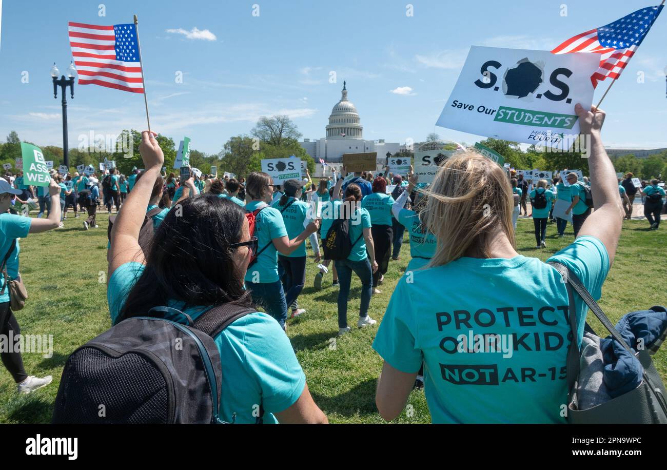 Washington, DC - Apr. 17, 2023. Hundreds march to the Capitol in Washington, DC to demand Congress pass a federal ban on assault weapons. Organized by March Fourth, a non-profit advocacy group of parents and educators, with goal of a federal ban on assault weapons, including AR-15s used in so many mass shootings. Stock Photo