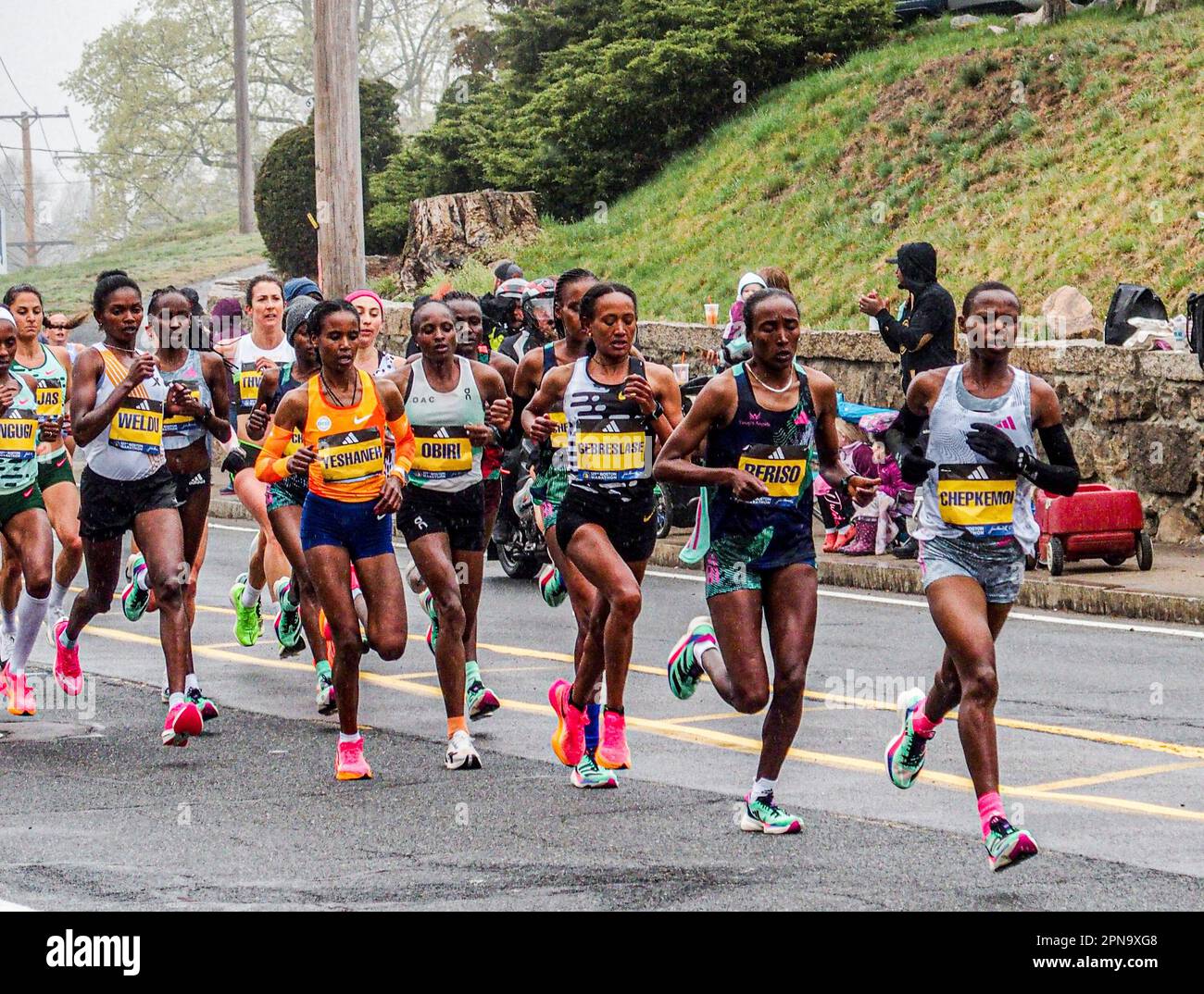 Boston, Massachusetts, USA. 17th Apr, 2023. The elite female division of the Boston Marathon pass through the 4th mile mark in Ashland, Massachussetts. HELLEN OBIRI (6TH in back) won first place while AMANE BERISO (2ND from front) won second place in the race. (Credit Image: © Bianca Otero/ZUMA Press Wire) EDITORIAL USAGE ONLY! Not for Commercial USAGE! Credit: ZUMA Press, Inc./Alamy Live News Stock Photo