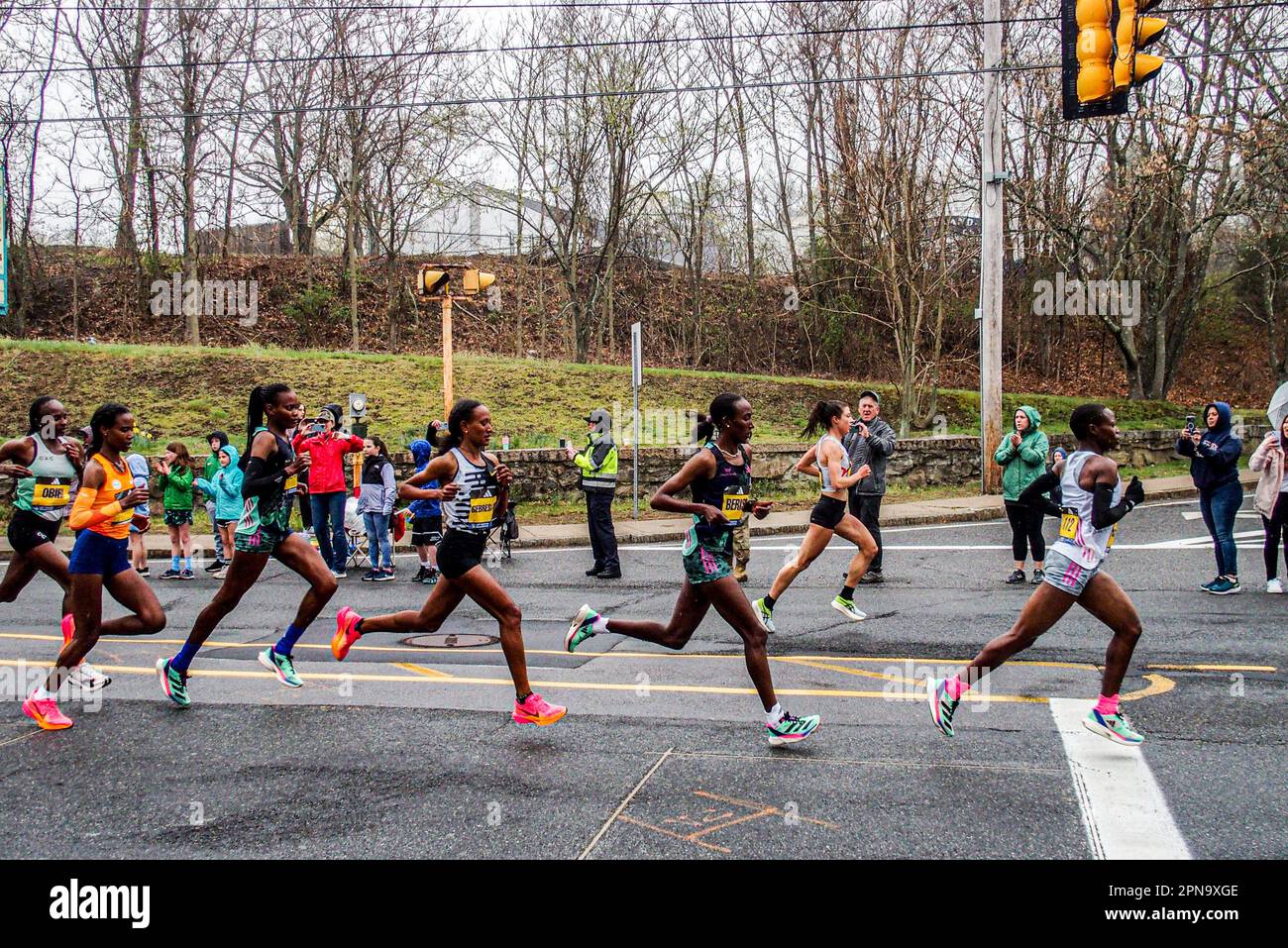 Boston, Massachusetts, USA. 17th Apr, 2023. The elite female division of the Boston Marathon pass through the 4th mile mark in Ashland, Massachussetts. HELLEN OBIRI (7th in back) won first place while AMANE BERISO (3rd from front) won second place in the race. (Credit Image: © Bianca Otero/ZUMA Press Wire) EDITORIAL USAGE ONLY! Not for Commercial USAGE! Credit: ZUMA Press, Inc./Alamy Live News Stock Photo