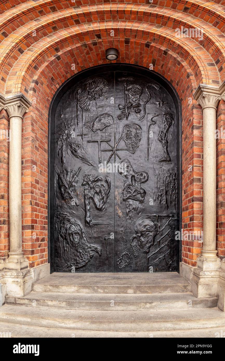 Rokilde, Denmark June 26 2015: Door detail Lutheran Roskilde Cathedral built around 1170 UNESCO site Early Scandinavian Gothic built in bricks Stock Photo