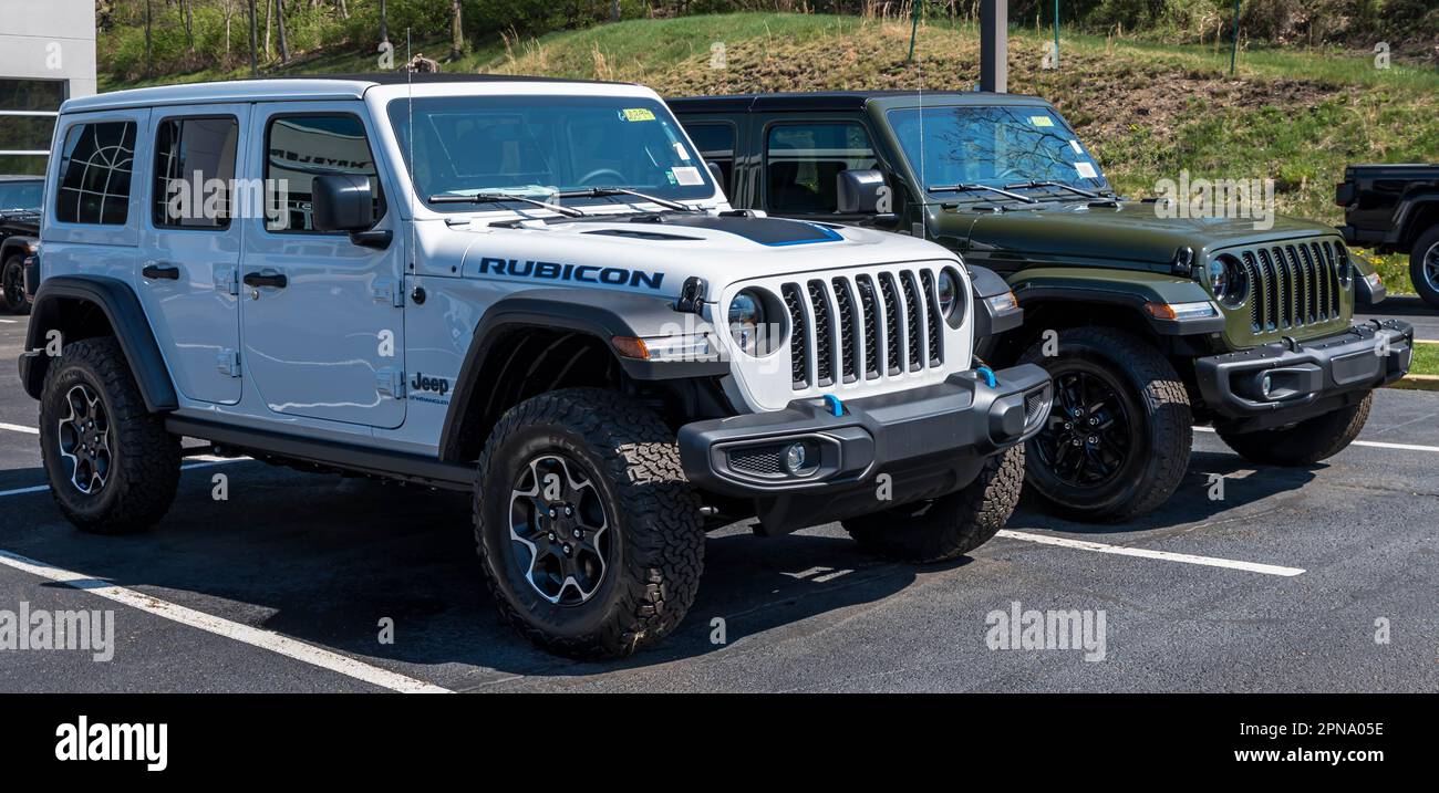 Two different, new Jeep Wranglers for sale at a dealership in