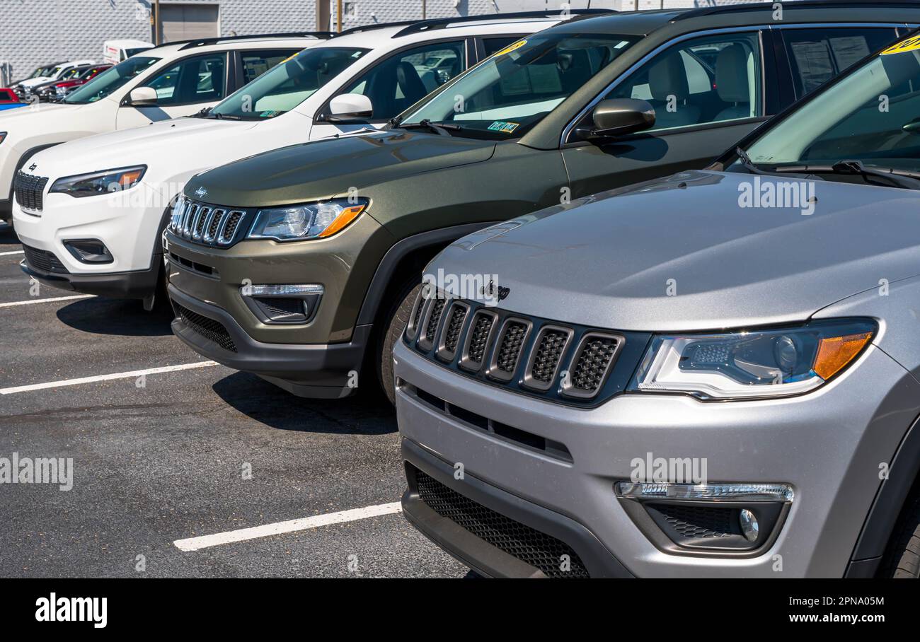 Three different Jeep SUVs lined for sale at a dealership in Monroeville