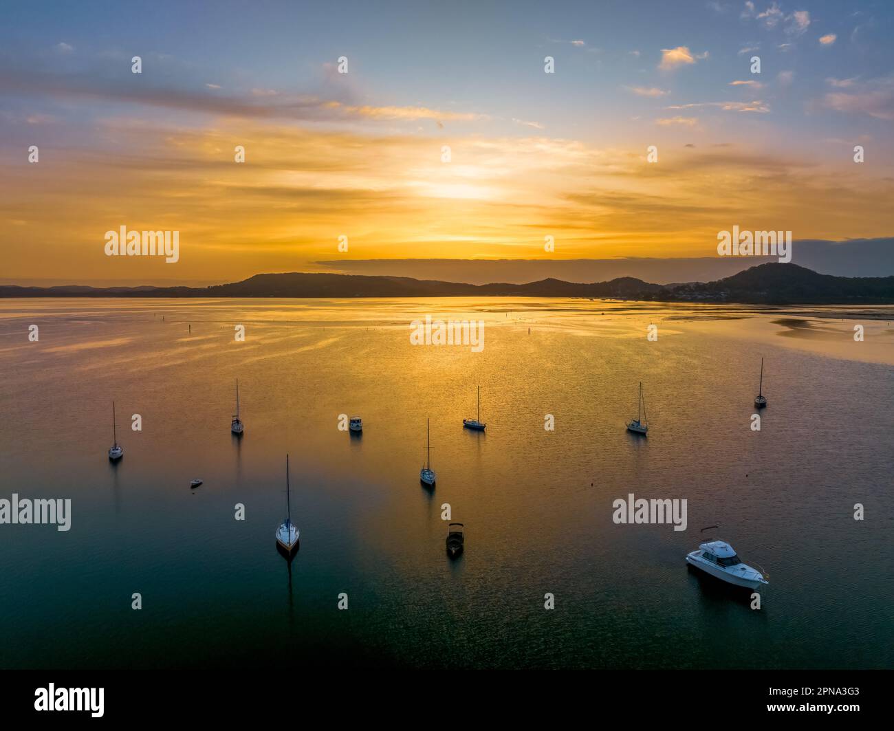 Sunrise over Brisbane Water at Couche Park, Koolewong on the Central Coast, NSW, Australia. Stock Photo