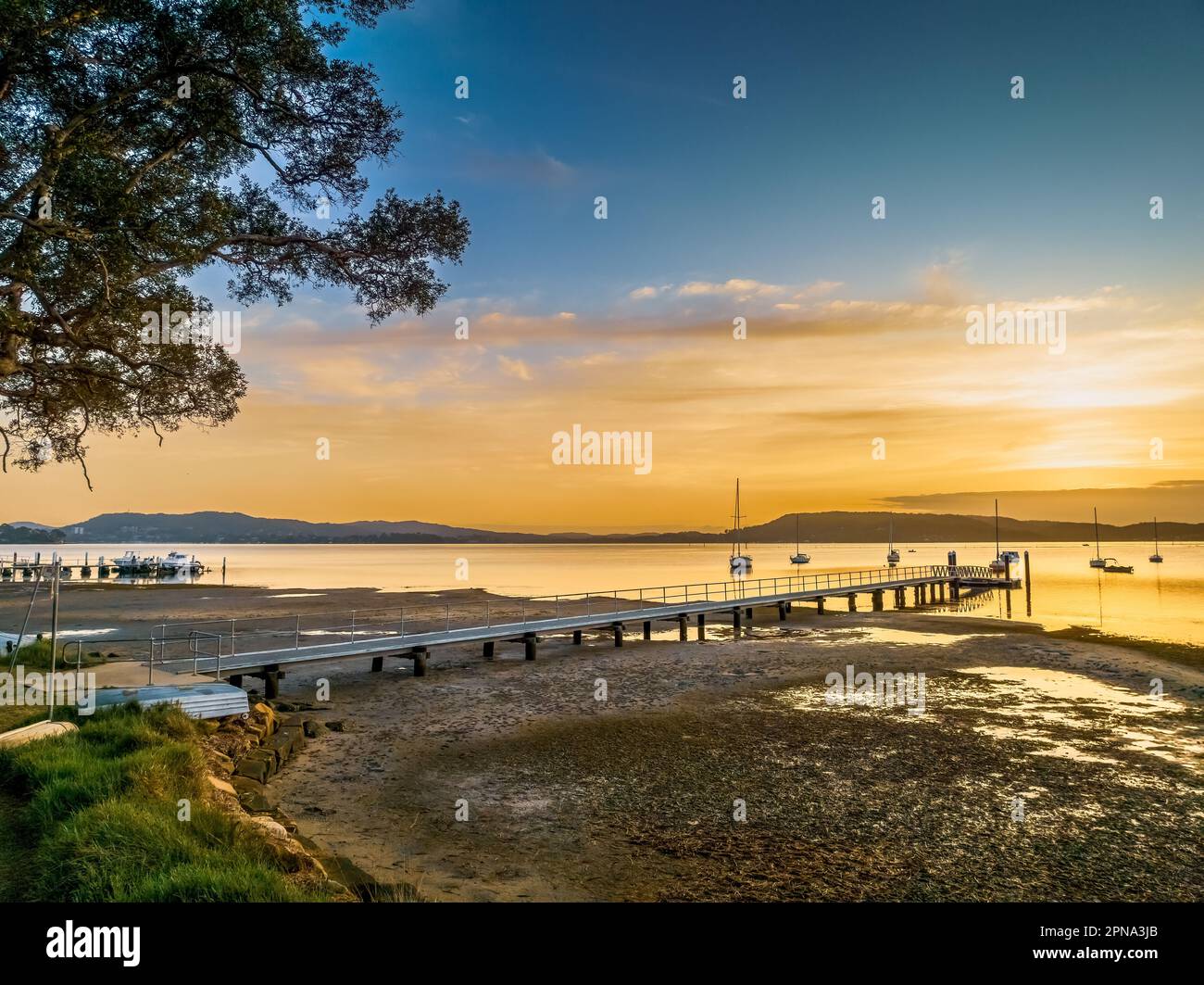Sunrise over Brisbane Water at Couche Park, Koolewong on the Central Coast, NSW, Australia. Stock Photo