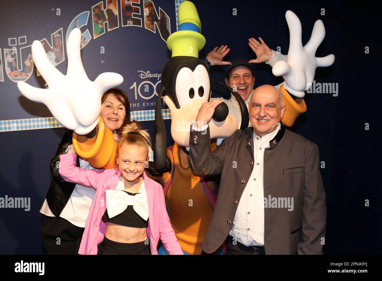 Munich, Germany . 17th Apr, 2023. Munich, Germany, 17. April 2023; Brigitte Walbrun with her granddaughter, Michel Guillaume, Schauspieler and Dr. Axel MUNZ with Goofy, during the VIP Opening at the DISNEY 100 Exhibition entertainment event held at the small Olympia hall in Munich Germany on 17. April 2023. picture and copyright Arthur THILL/ATP images (THILL Arthur/ATP/SPP) Credit: SPP Sport Press Photo. /Alamy Live News Stock Photo