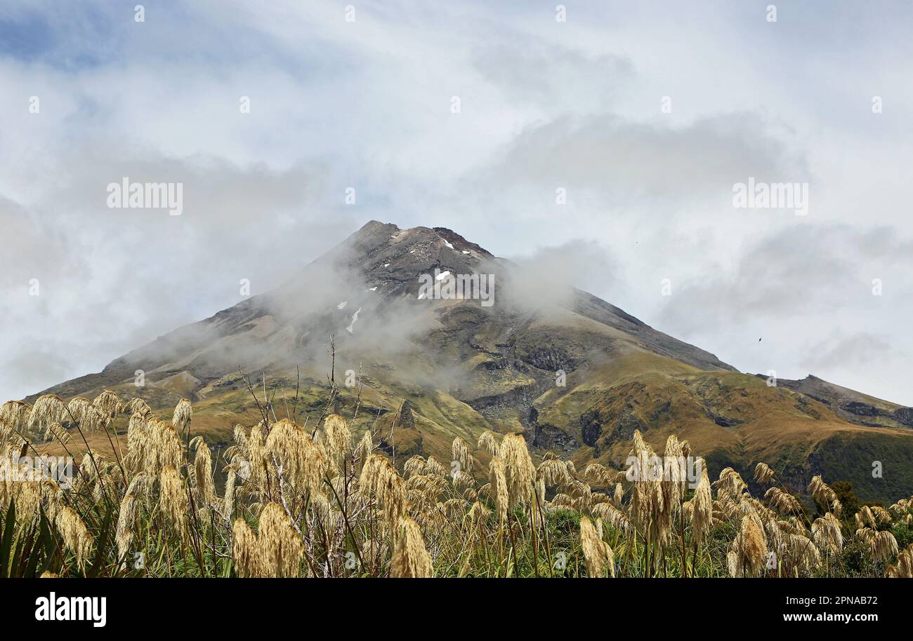 Mt Egmont in clouds - Taranaki - New Zealand Stock Photo