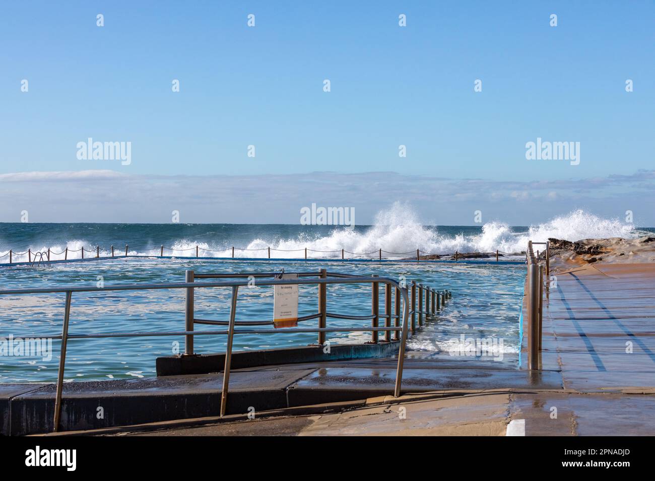 Waves crashing over Dee Why Beach Rockpools, ocean swimming pools Stock ...