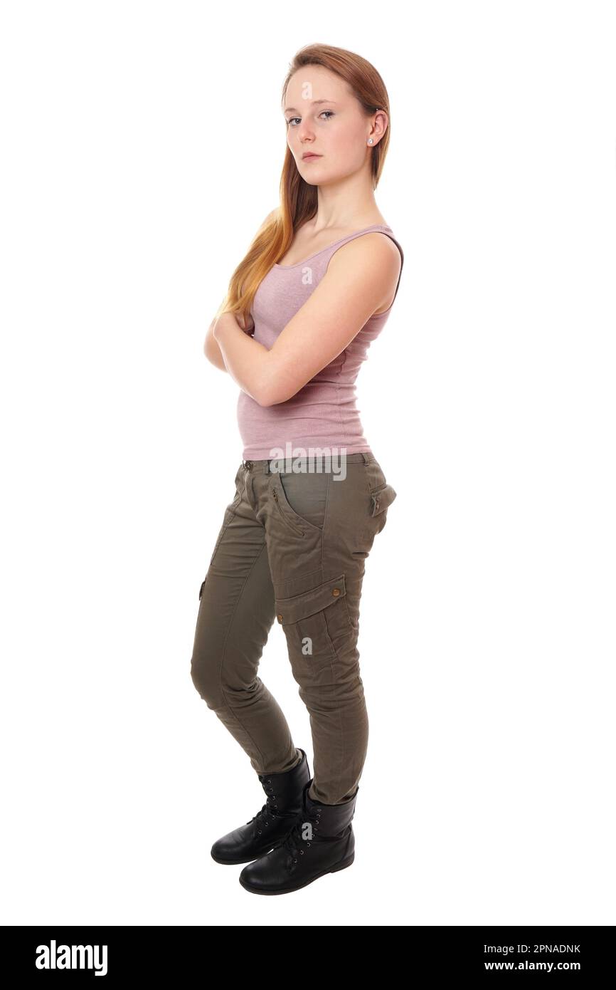 young woman wearing tank top, military style khaki pants and boots Stock Photo