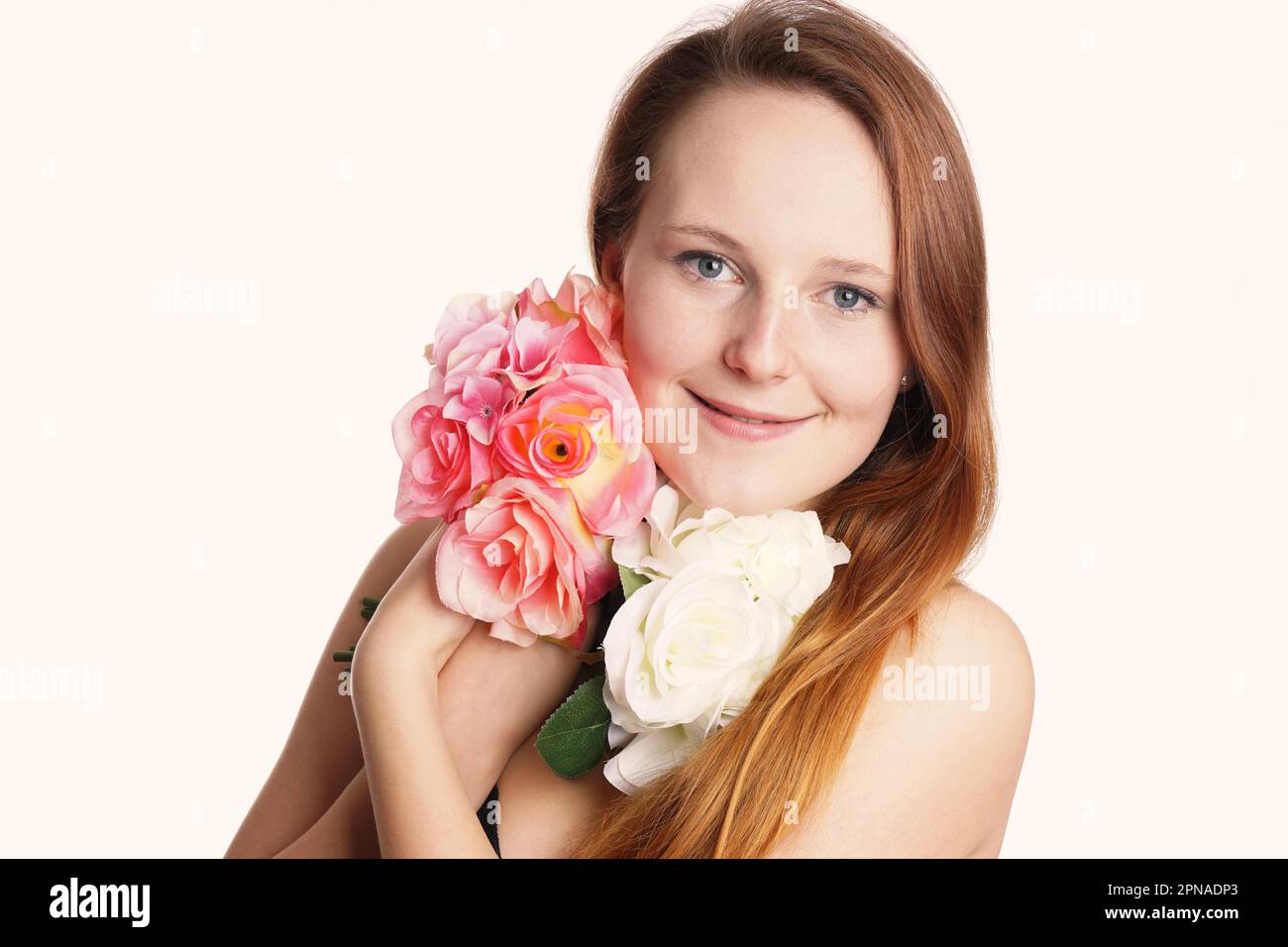 portrait of a young woman with flowers Stock Photo