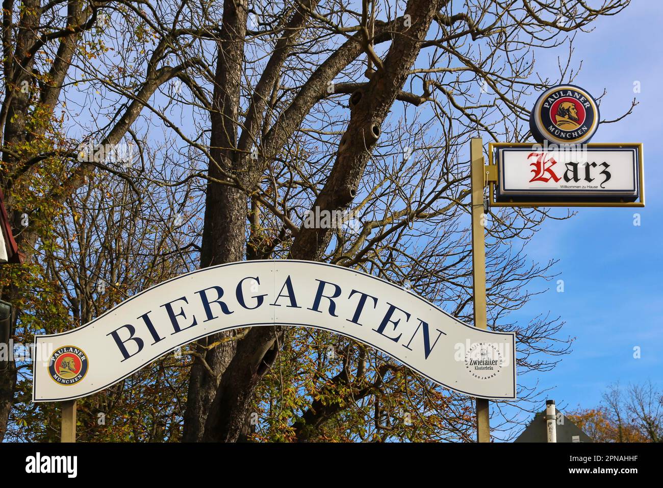 Gmindersdorf, pub, restaurant Karz, inn sign, writing, text, letters, entrance to beer garden, Paulaner advertisement, former workers housing estate Stock Photo