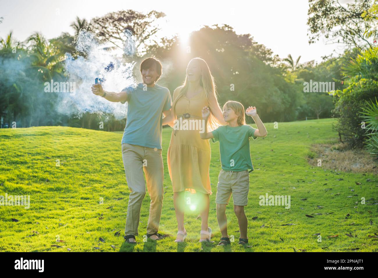 Pregnant mom, dad and son at the gender party on the golf course ...