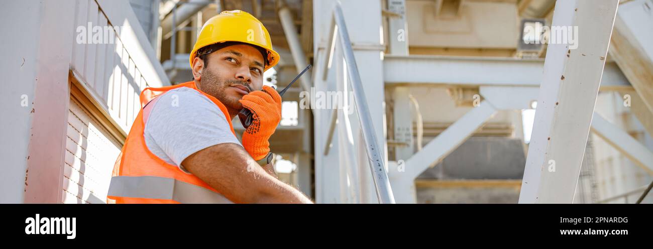 Young foreman working hard at building industry Stock Photo