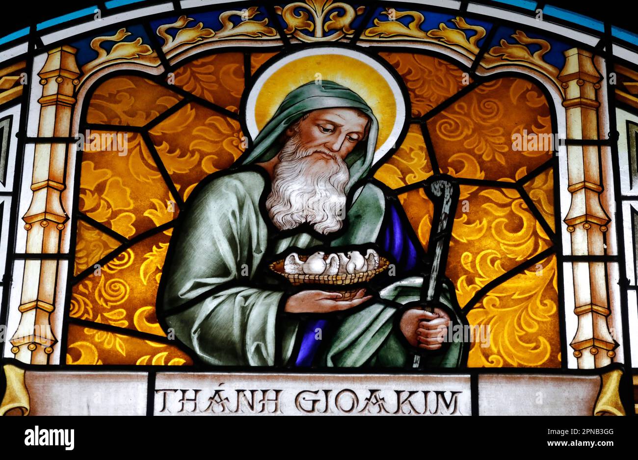 Thi Nghe Church. Stained glass.  Saint Joachim was the husband of Saint Anne and the father of Mary. Ho Chi Minh City. Vietnam. Stock Photo