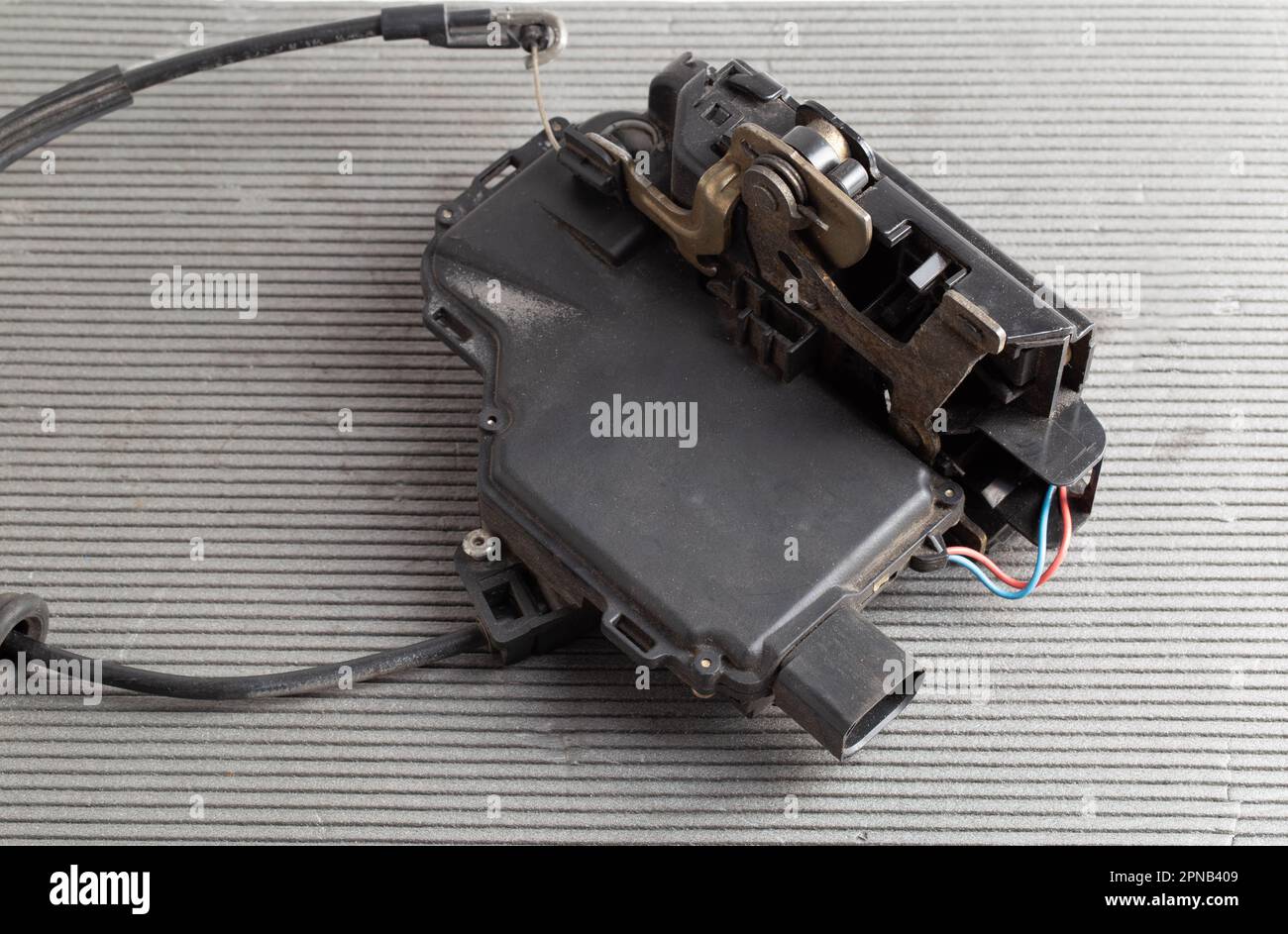 Car electric door lock, closeup. Limit switch failure, automotive part. Car electrical repair