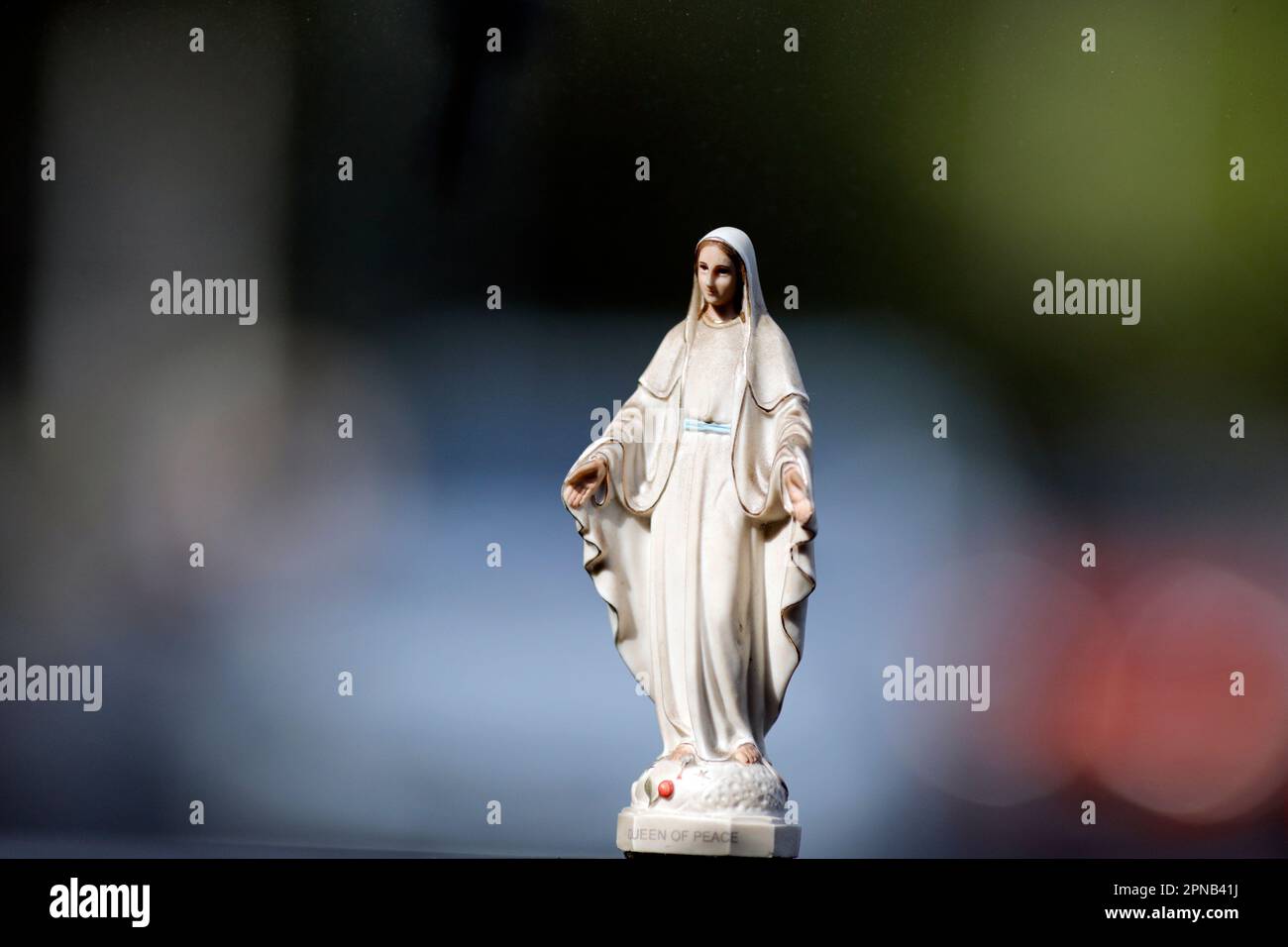 Virgin Mary figurine in a car. Ho Chi Minh City. Vietnam. Stock Photo