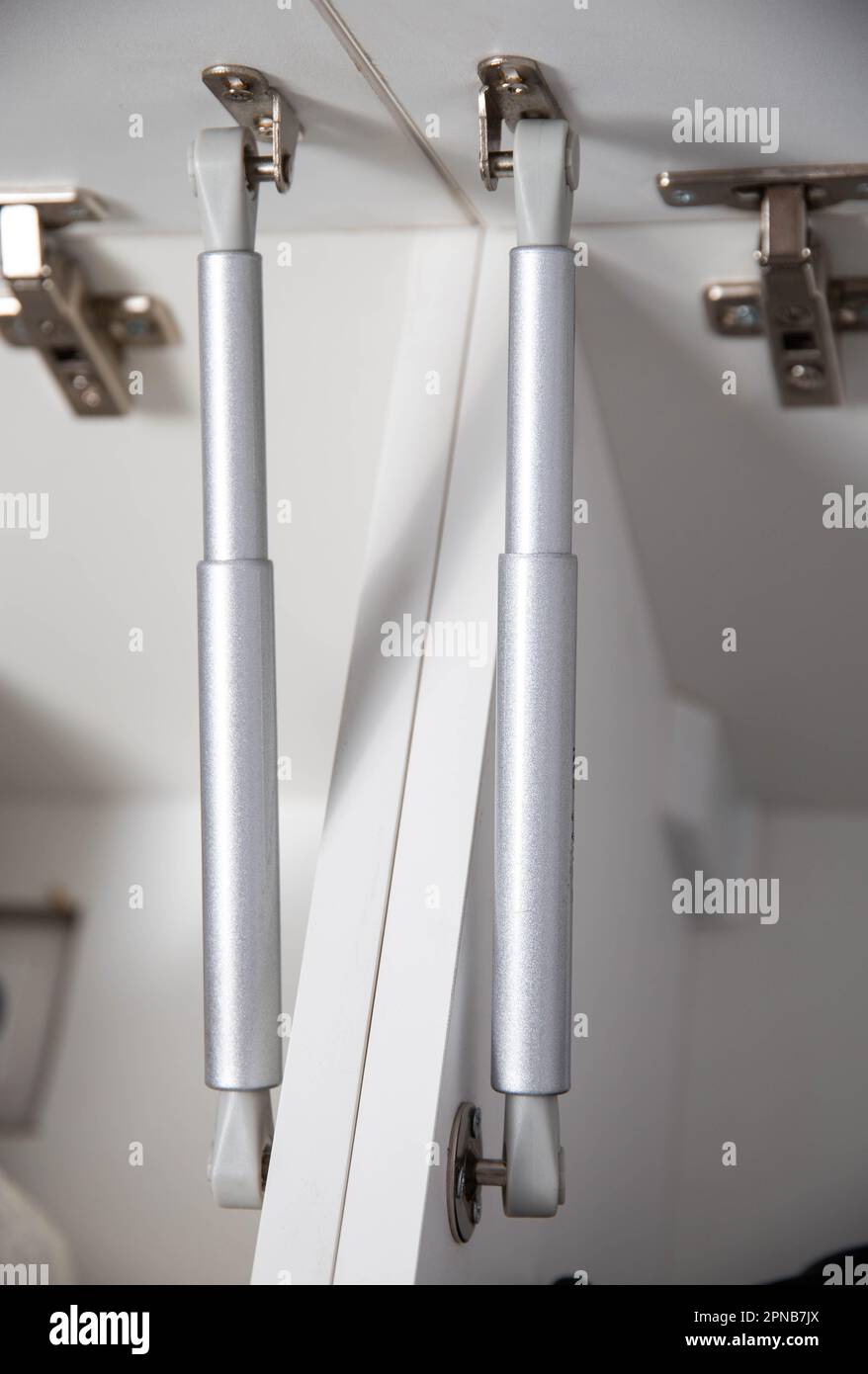 Retractable gas shock absorber for opening the drawer in the kitchen