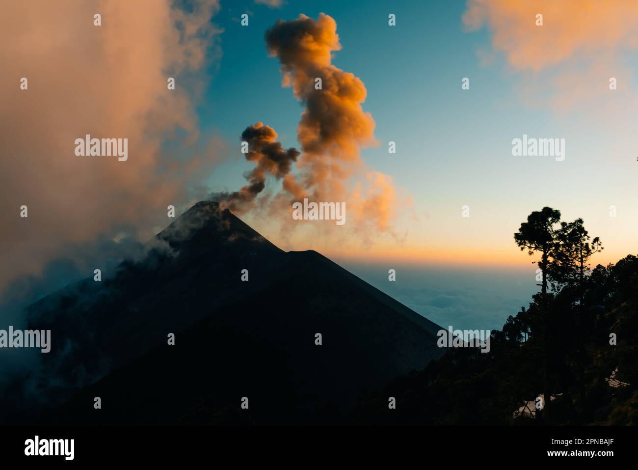 Volcano Fuego erupting at night from view of Volcano Acatenango ...