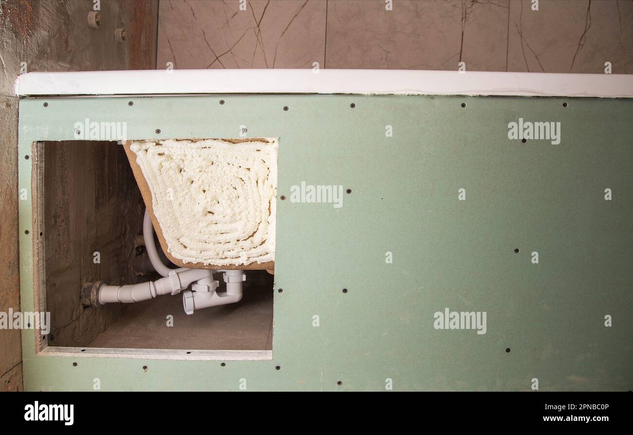 Renovation in the bathroom, installation of a new acrylic bathtub