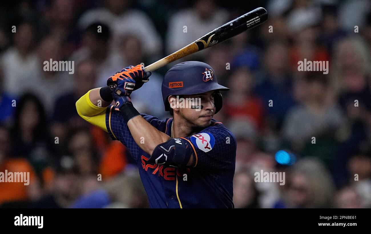 Houston Astros second baseman Mauricio Dubon bats during the sixth inning  of a baseball game against the Toronto Blue Jays, Monday, April 17, 2023,  in Houston. (AP Photo/Kevin M. Cox Stock Photo 