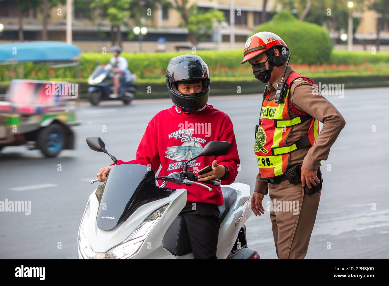 Bangkok, Thailand - April 15, 2023: Police officer on the streets of