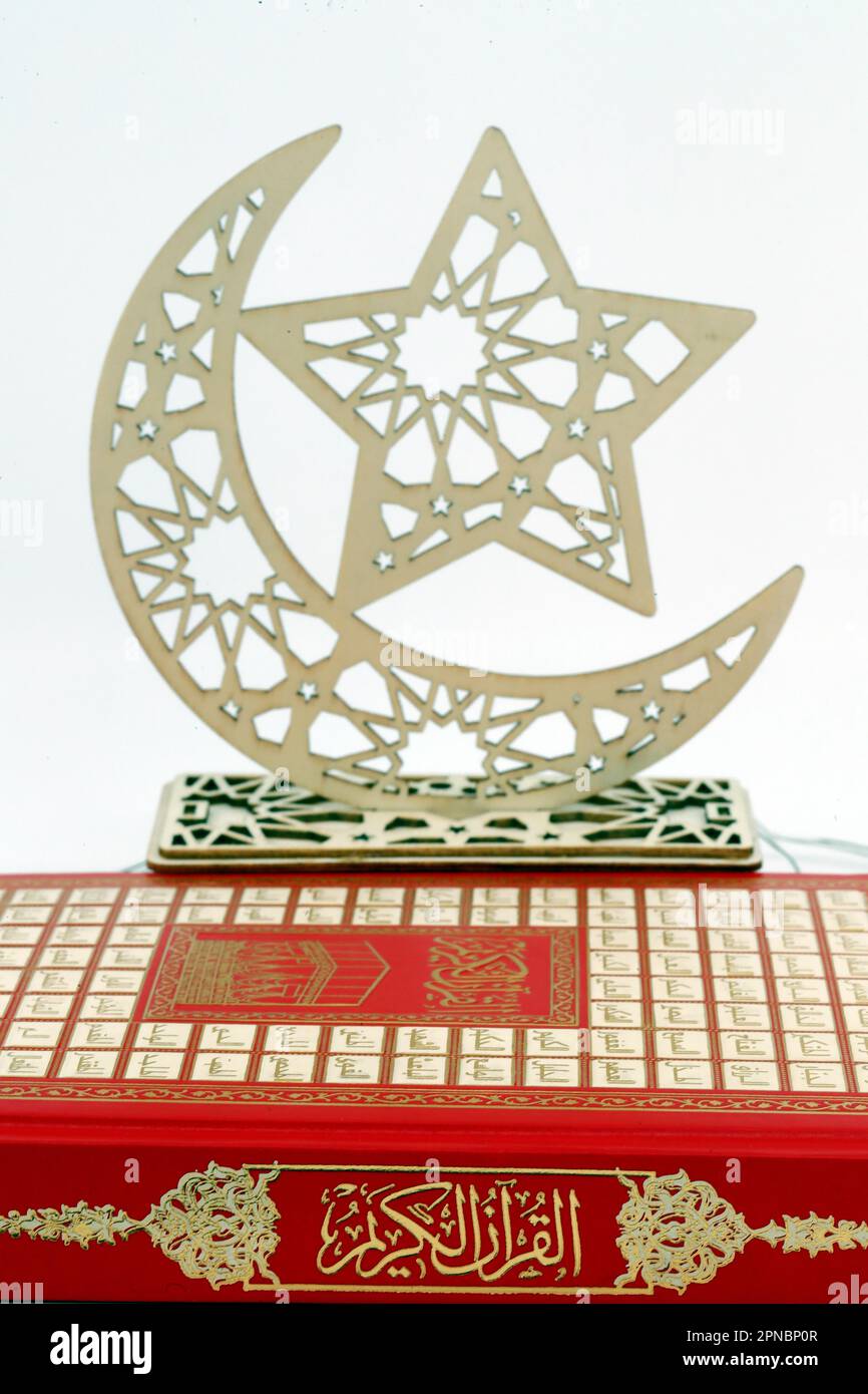 holy-quran-kuran-and-crescent-and-star-symbols-of-islamic-faith