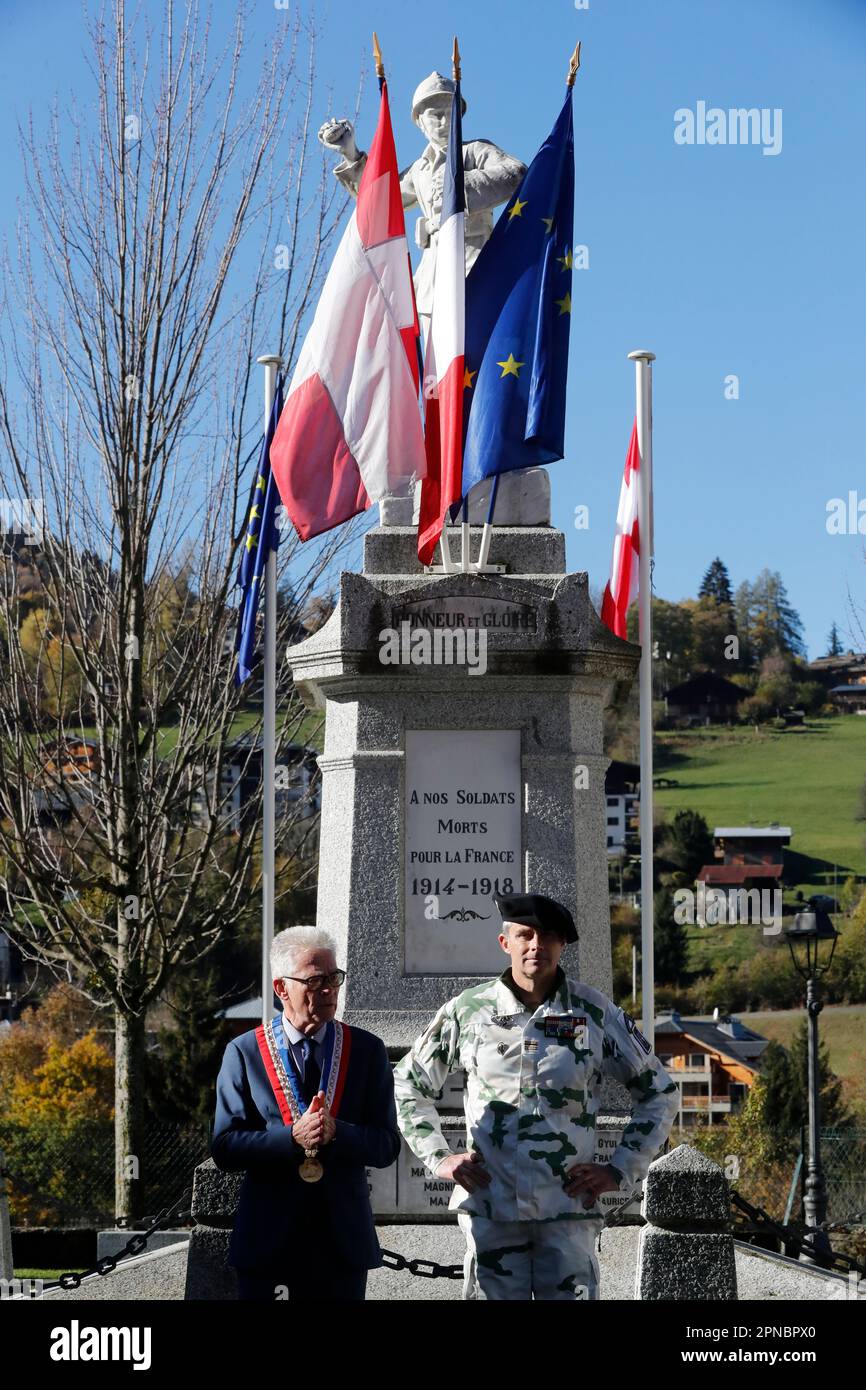 War memorial statue with European, French et Savoie flags.  French commemoration of the armistice day november 11 1918, end of the first world war. Sa Stock Photo