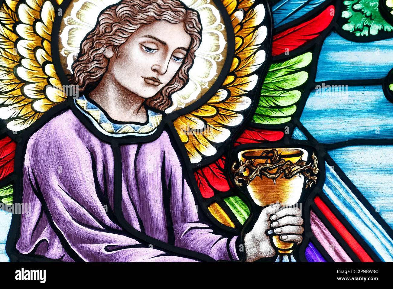 Praying angel stained glass hi-res stock photography and