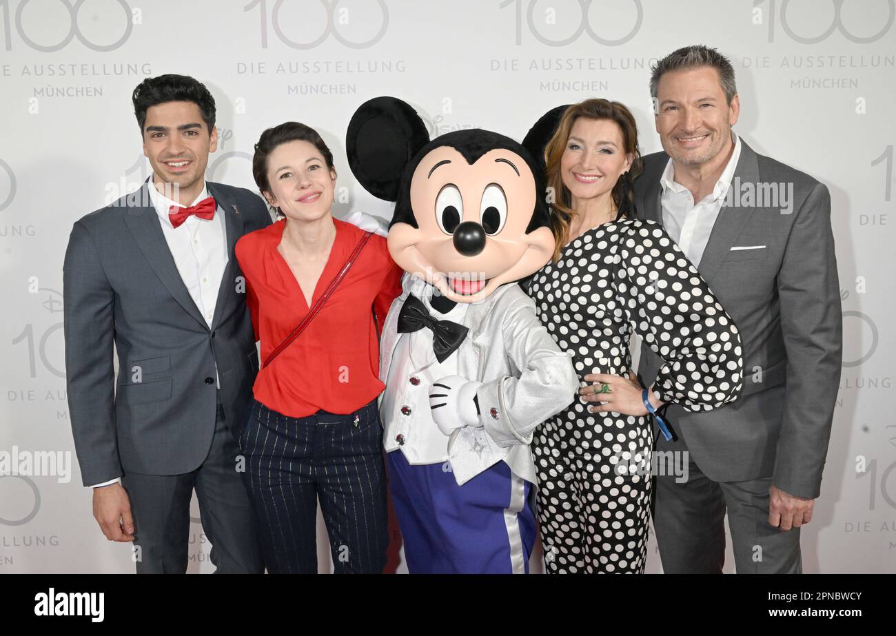 Munich, Germany. 17th Apr, 2023. Marcel Zuschlag, (l-r) Dorothée Neff, Daniela Kiefer and Dieter Bach present themselves on the red carpet of the 'Disney 100' exhibition in the Small Olympic Hall. The show provides insights into the history and works of the Walt Disney Company. Credit: Felix Hörhager/dpa/Alamy Live News Stock Photo