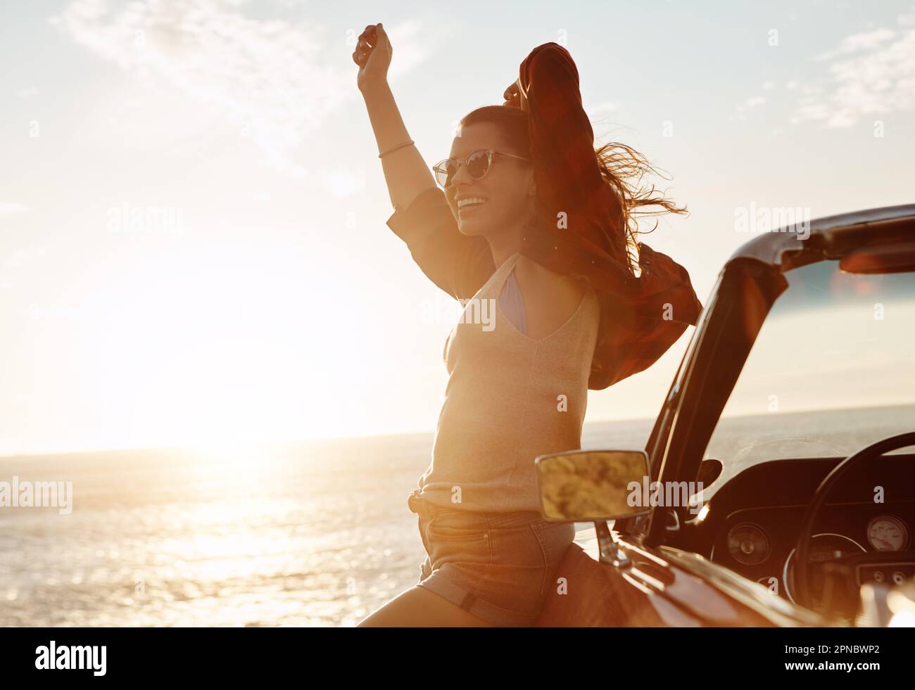 True freedom fills the heart with happiness. a happy young woman ...