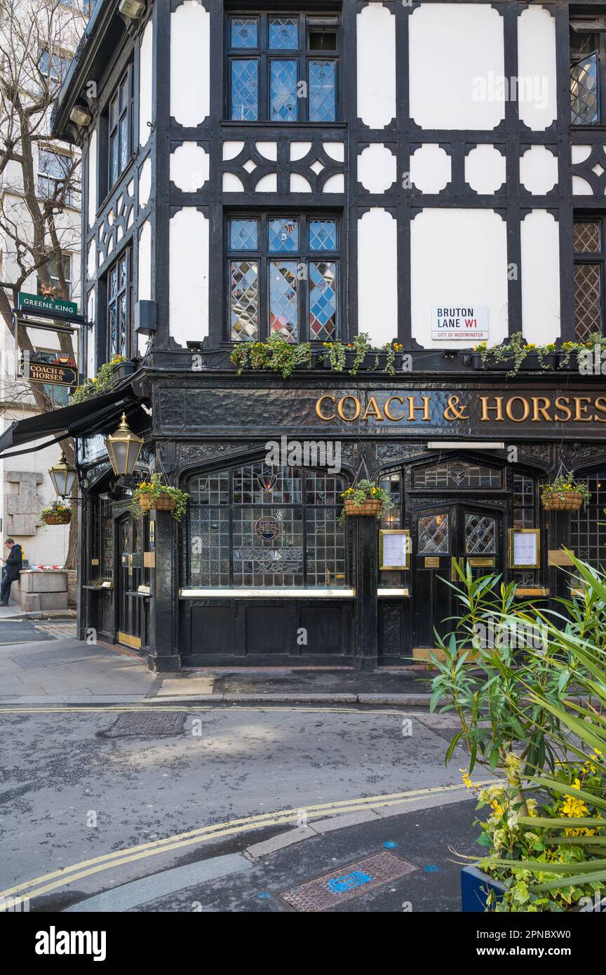 Coach & Horses Mayfair. A narrow Grade II listed public house with mock