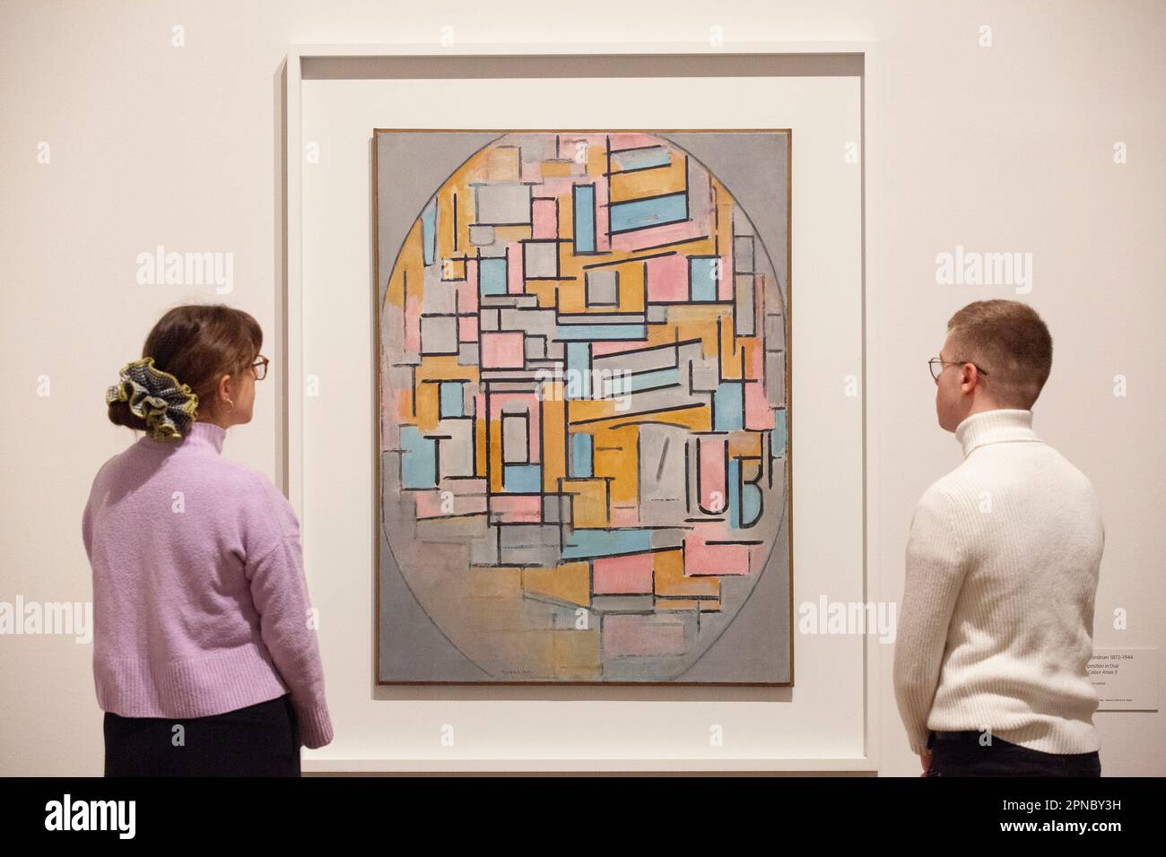 London, UK. 18th Apr, 2023. Tate Modern presents an exhibition of Hilma af Klint and Piet Mondrian, two pioneers of abstact art with very different sensibilities. This painting is 'Composition in Oval with Colour Areas II', 1914, by Piet Mondrian. Credit: Anna Watson/Alamy Live News Stock Photo