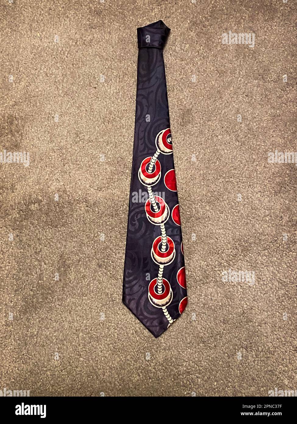 Still life of a beautiful blue art deco era necktie likely from the 1940s. The label says Kreway. Stock Photo