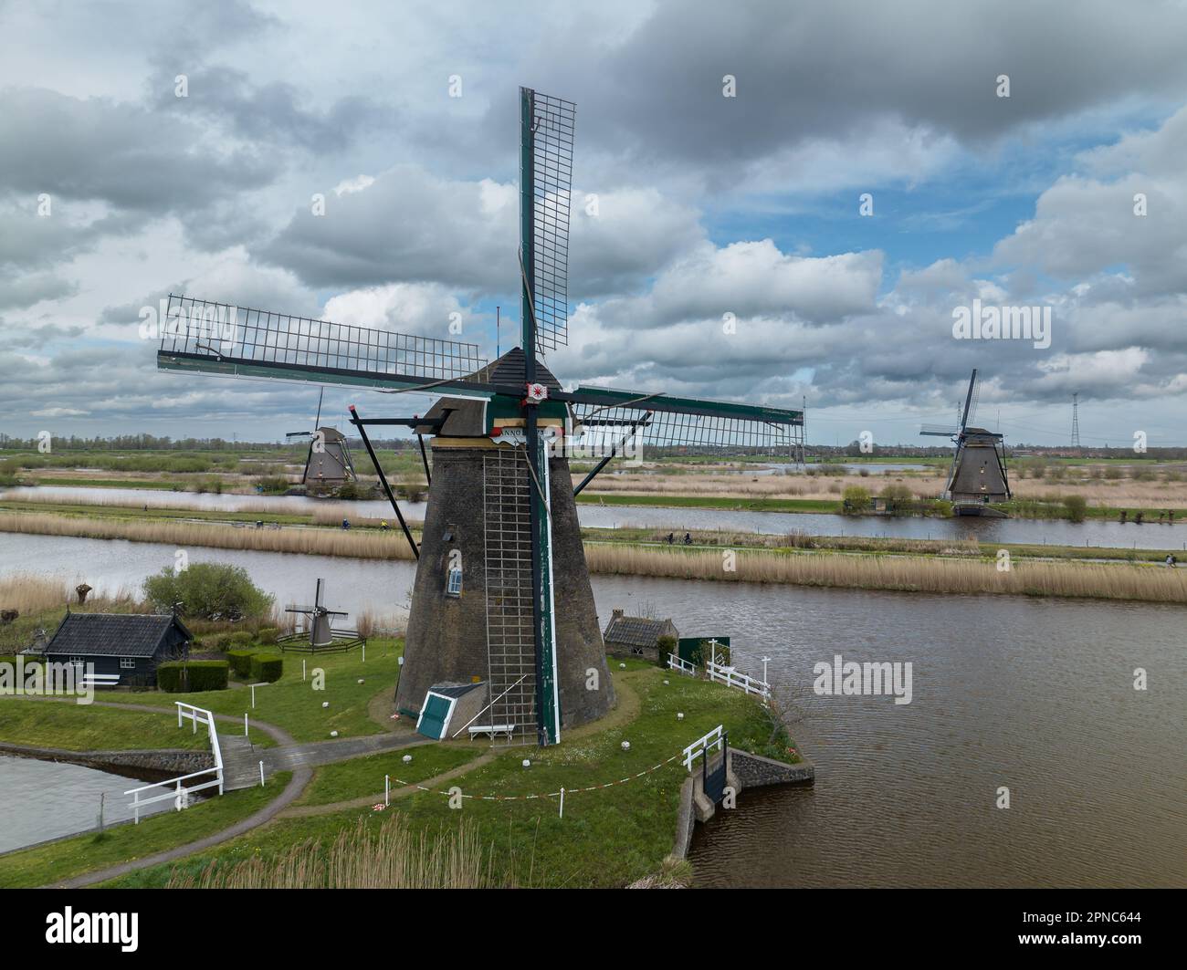 kinderdijk windmill park in Netherlands. A part of the Unesco world heritage site. Typical Holland windmill. You ccan see like this everyvhere you go Stock Photo