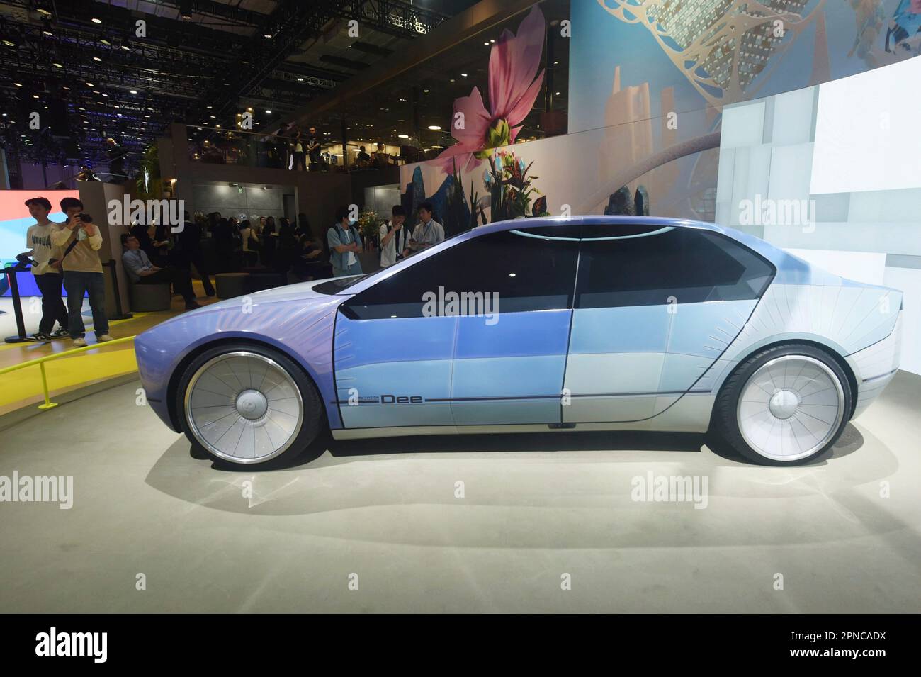 A BMW i Vision Dee color-changing concept car is displayed at Shanghai ...