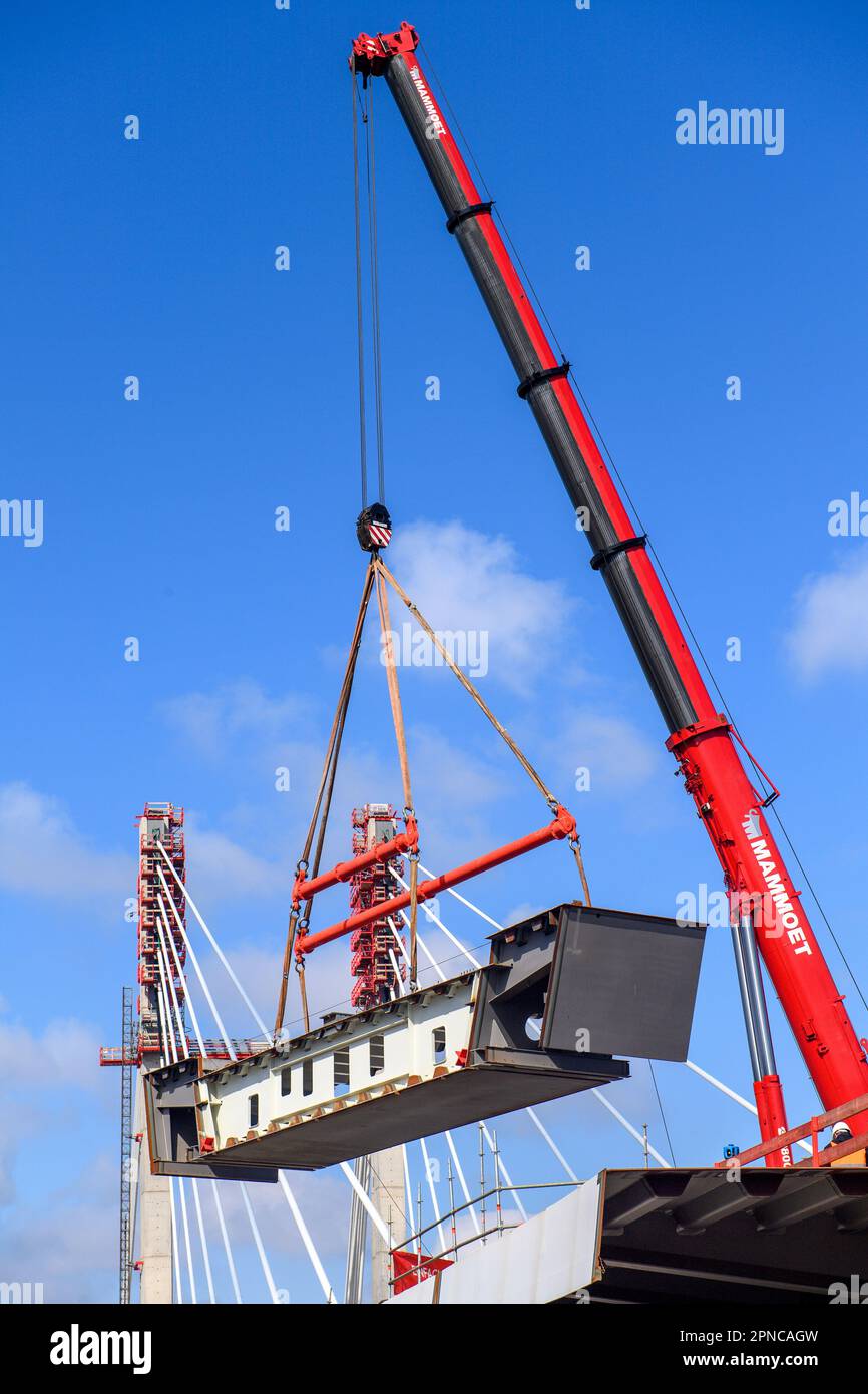 Magdeburg, Germany. 18th Apr, 2023. A crane lifts a 50ton bridge