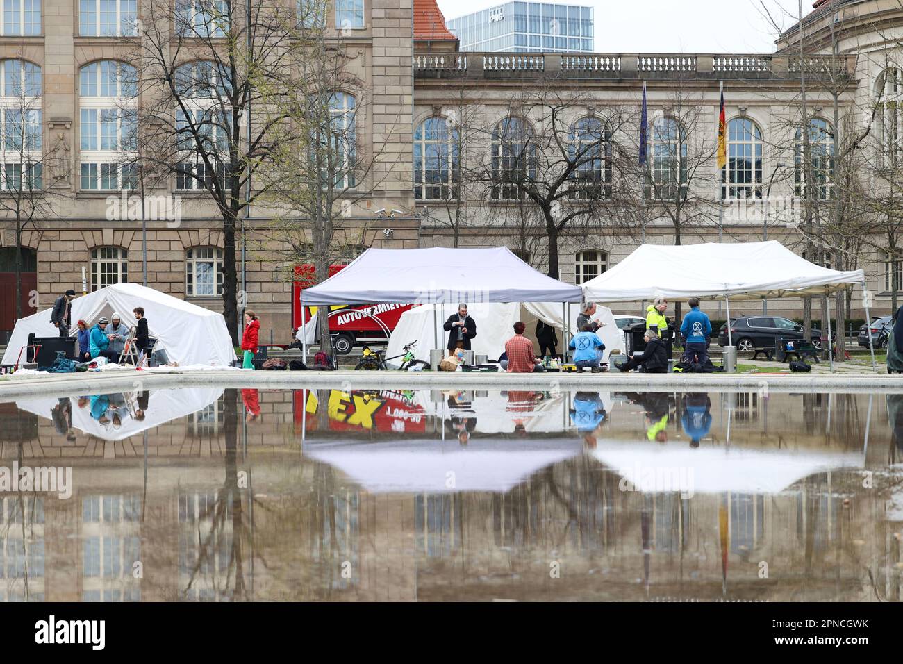 Berlin, Germany. 18th Apr, 2023. The protest camp in Invalidenpark in front of the Federal Ministry of Economics and Climate Protection is dismantled. Members of the Extinction Rebellion movement, together with other activists, had been drawing attention to the climate and biodiversity crisis here for a week since last Wednesday. For this purpose, they had planned various actions, registered demonstrations, but also civil disobedience were part of it. Credit: Jörg Carstensen/dpa/Alamy Live News Stock Photo