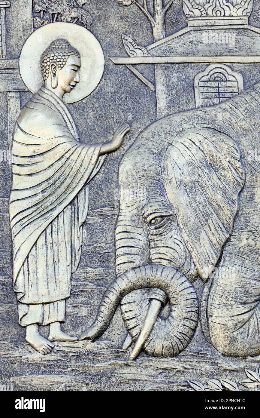 Tinh Xa Ngoc Chau pagoda.  Life of Buddha, Siddhartha Gautama. Taming an Elephant with loving kindness - Nalagiri was the Royal Elephant. Chau Doc. Vi Stock Photo