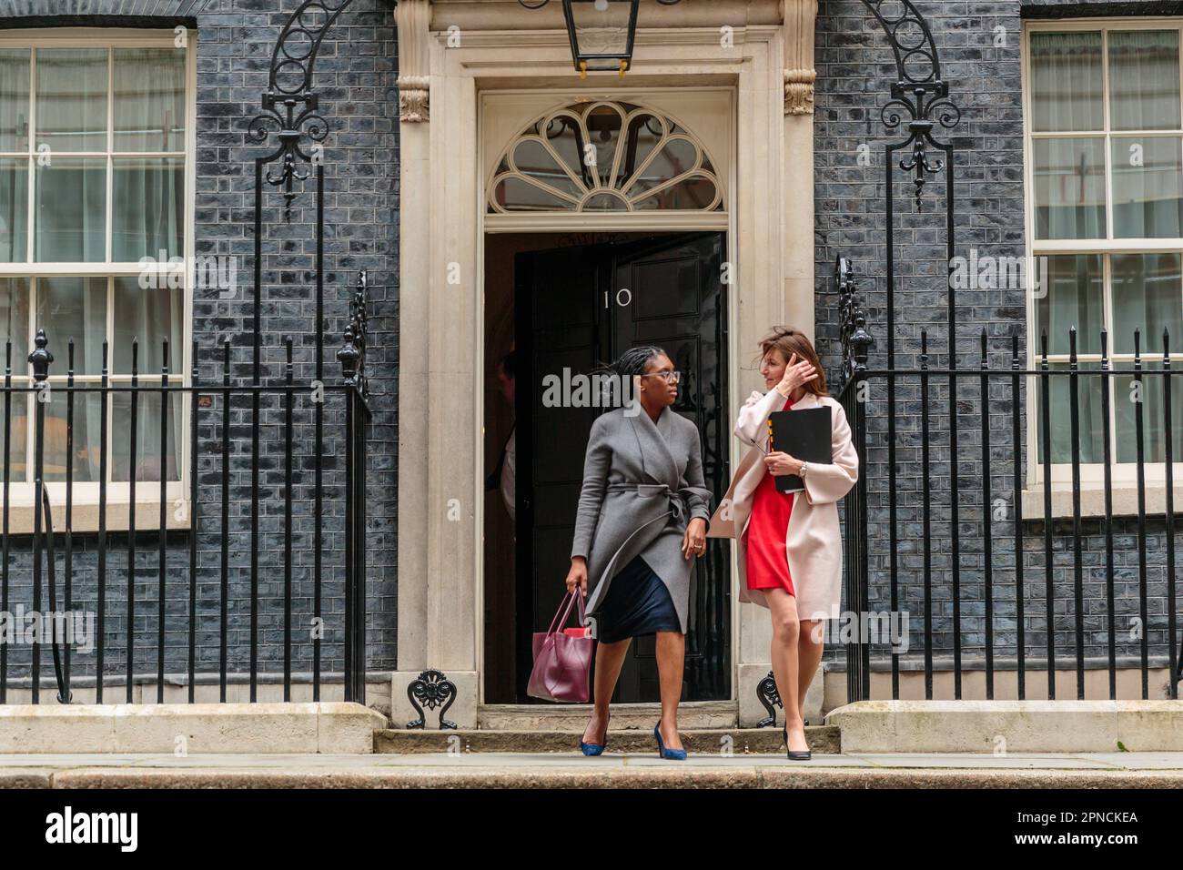 Downing Street, London, UK. 18th April 2023.  Kemi Badenoch MP, Secretary of State for Business and Trade and President of the Board of Trade and Minister for Women and Equalities, and Lucy Frazer MP, Culture Secretary, attends the weekly Cabinet Meeting at 10 Downing Street. Photo by Amanda Rose/Alamy Live News Stock Photo