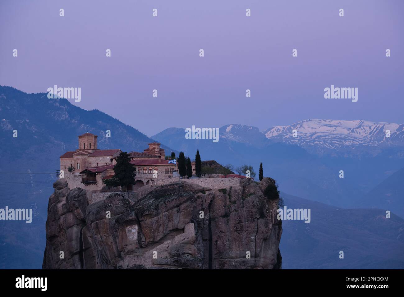 View of the Monastery of Holy Trinity, Meteora at sunrise in Spring Stock Photo