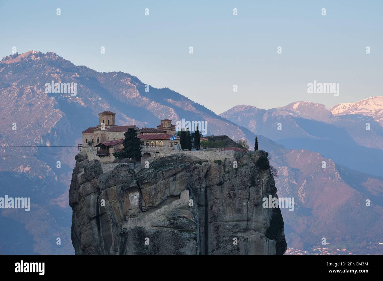 View of the Monastery of Holy Trinity, Meteora at sunrise in Spring Stock Photo