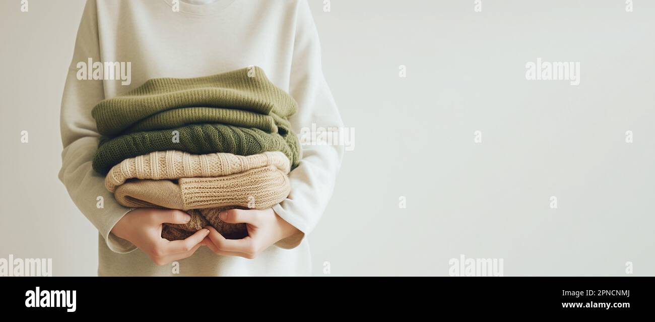 A stack of clothes. Clothes Donation, Renewable Concept. Preparing